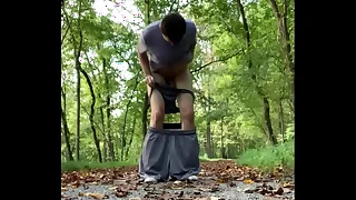 Boy jerks off in forest